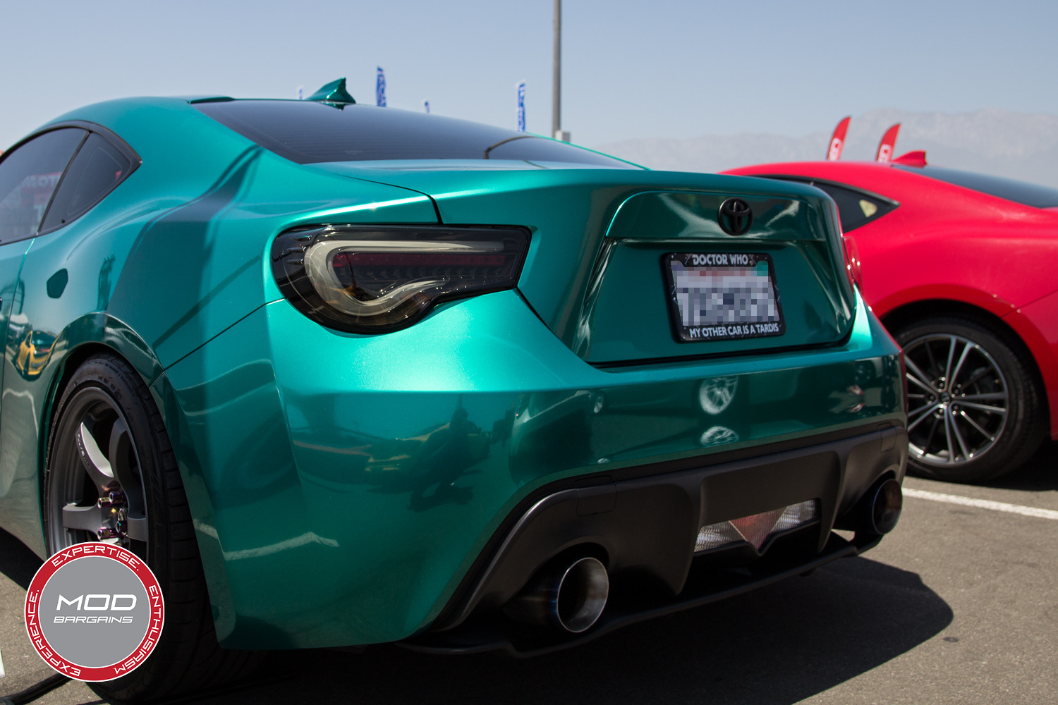 Awesome metallic teal wrapped FR-S with Smoked Lens Valenti Tail Lights and a Perrin Catback Exhaust