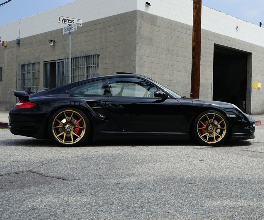 Porsche 997tt forgestar cf5v race gold side view