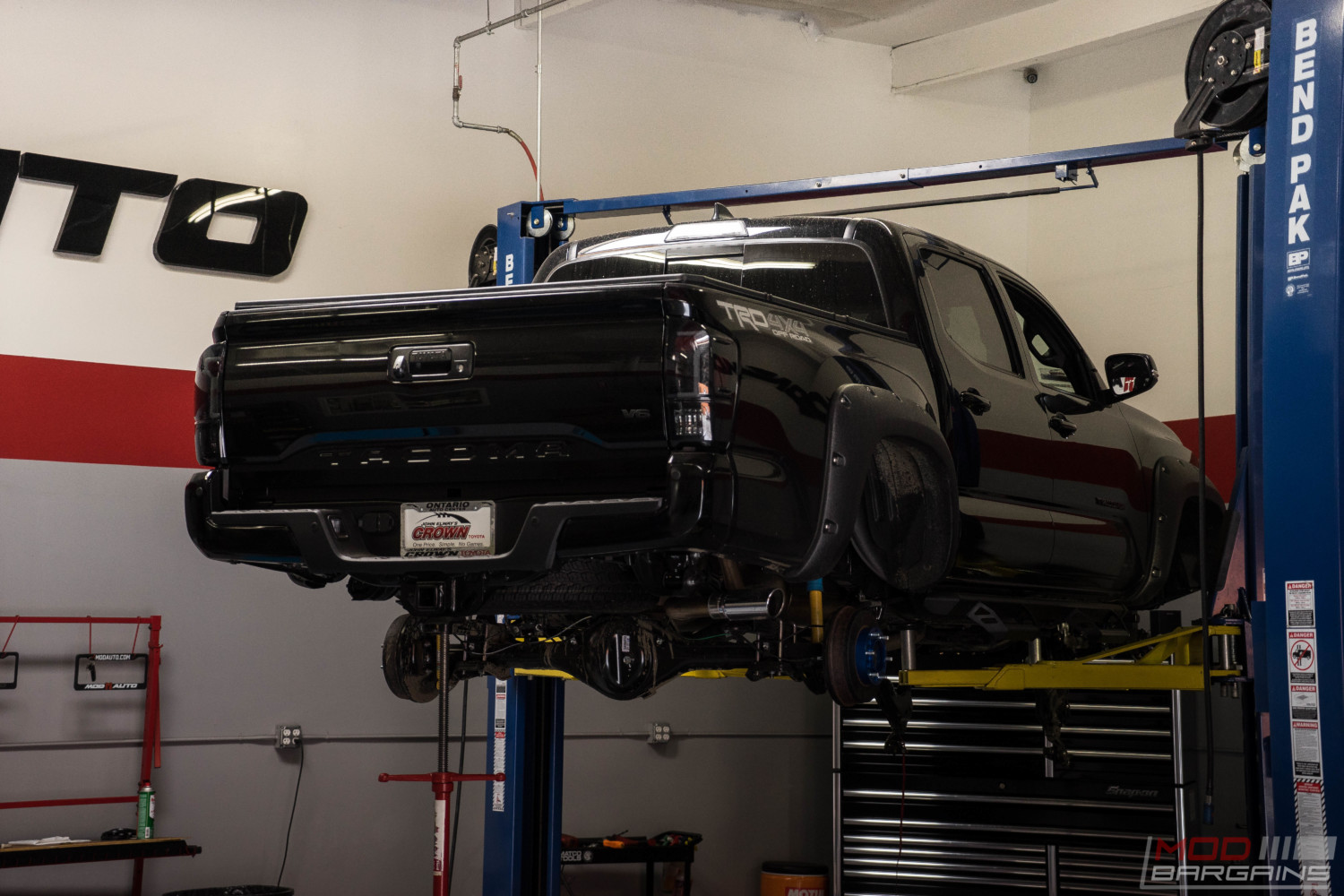 toyota tacoma murdered black trd offroad fuel offroad nitto trail grappler magnaflow exhaust pro comp lift kit diode dynamics LED