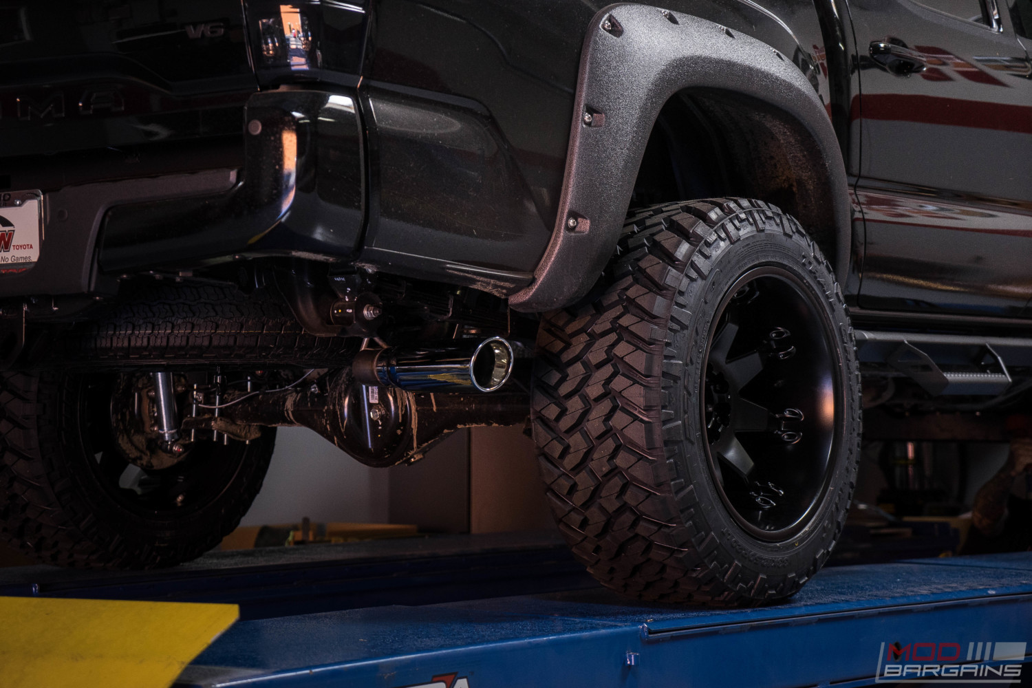 toyota tacoma murdered black trd offroad fuel offroad nitto trail grappler magnaflow exhaust pro comp lift kit diode dynamics LED